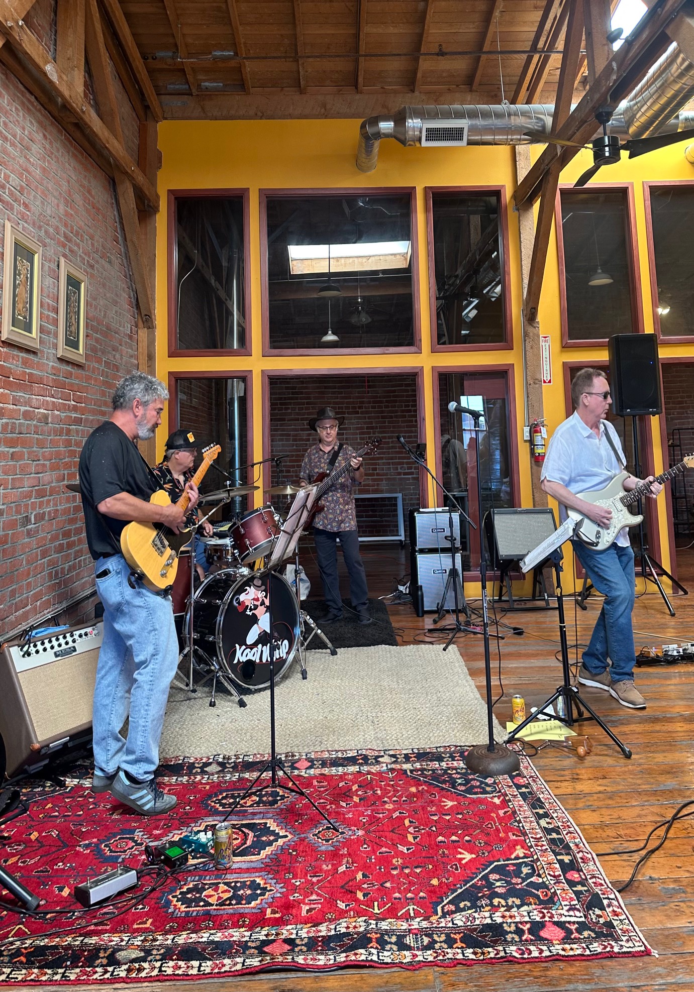Indoor venue performance with brick walls
