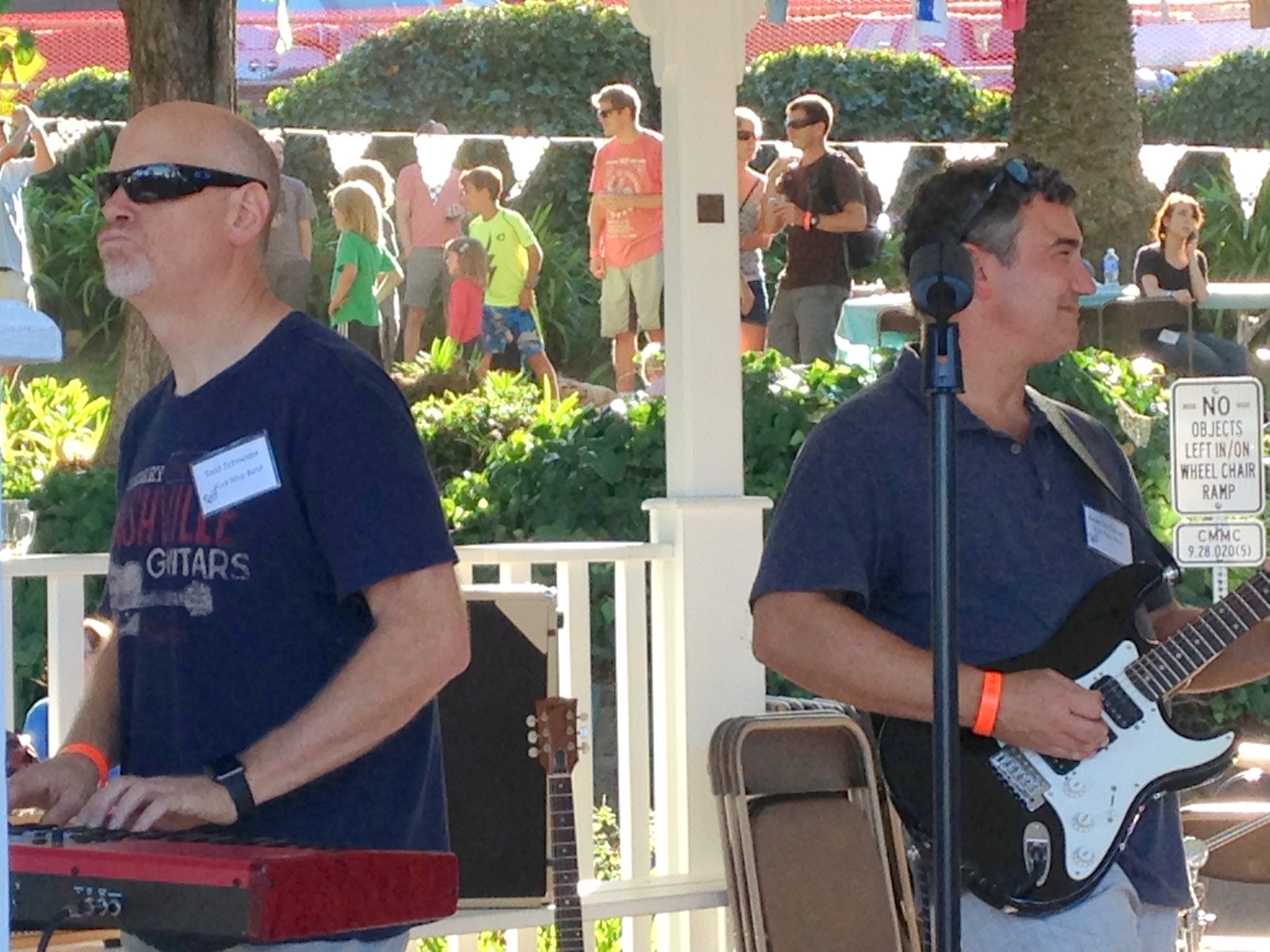 Band members at outdoor event